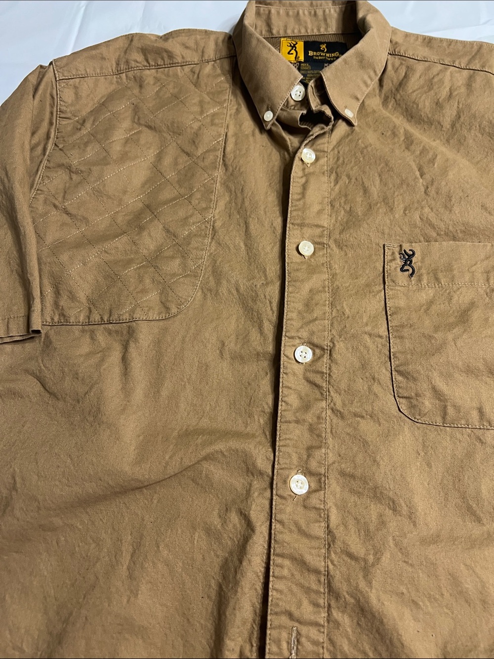 Browning  Shooting Shirt Button-Down with Padded recoil patch and pocket inside.
